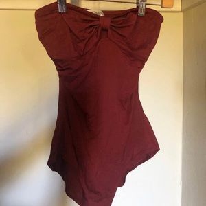 Women clothing: cute burgundy bodysuit.